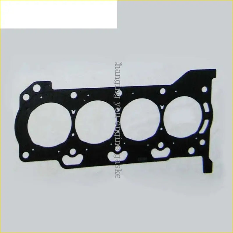 Black metal cylinder head gasket with four circular openings and mounting holes for toyota corolla yaris auris engines