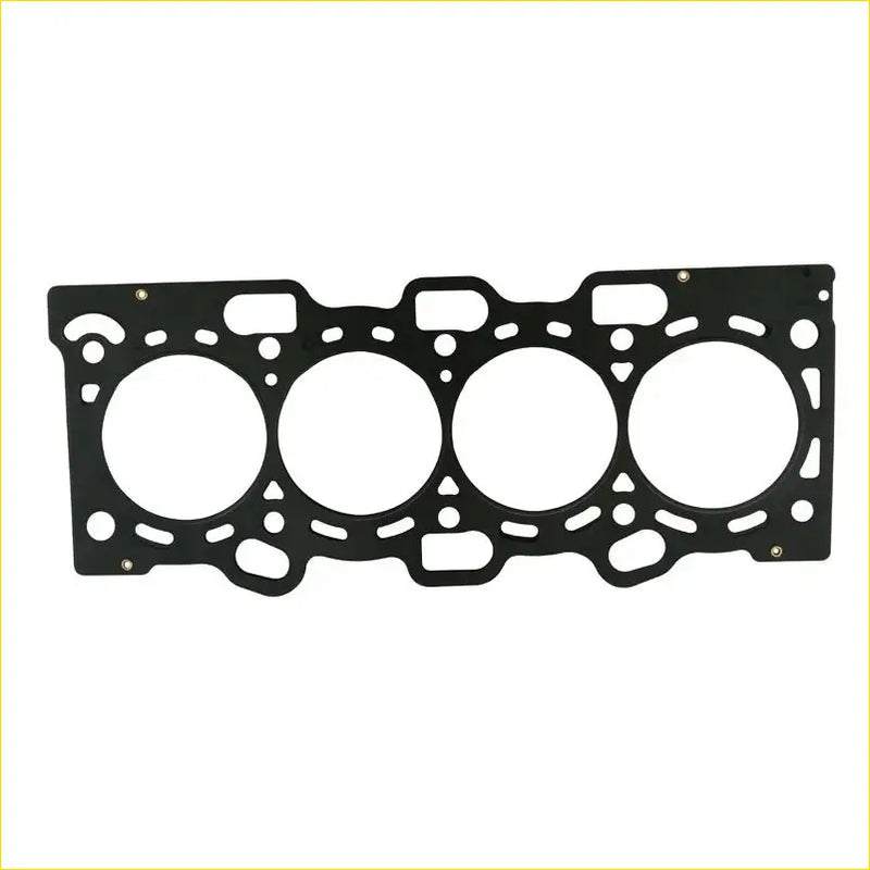 Black metal cylinder head gasket with four circular openings and intricate cutouts for mitsubishi carisma lancer v mirage