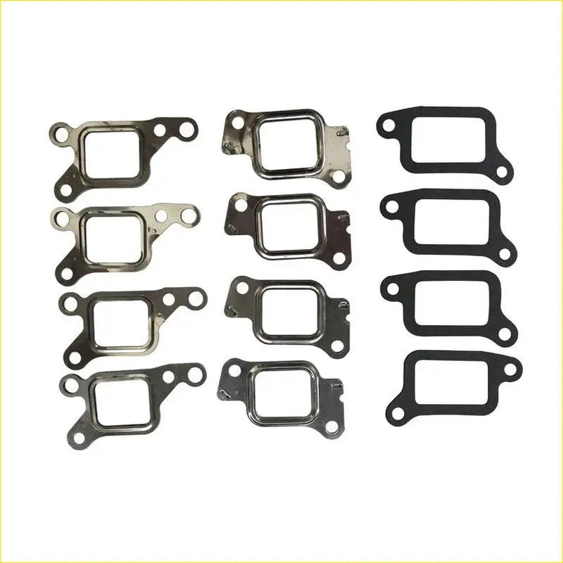 Set of metallic and black rubber automotive exhaust manifold gaskets with mounting holes for mitsubishi pajero ii 2.8td
