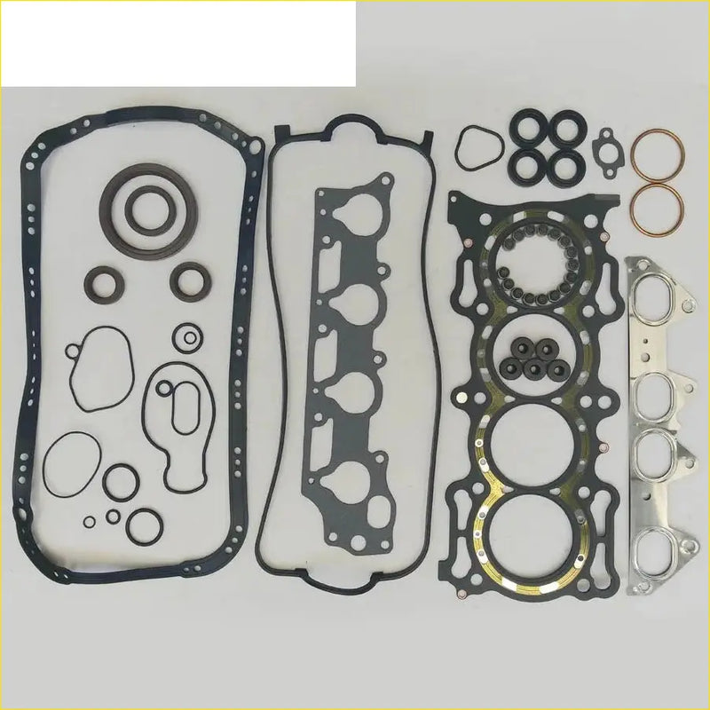 Black rubber gasket set with metallic rings and precision-cut seals for acura honda accord v 2.2 engine assembly