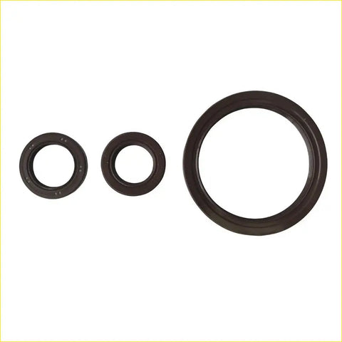 Three black rubber crankshaft oil seals of different sizes for honda civic eh9 eg8 sohc d15z1 d16a6 set on white background