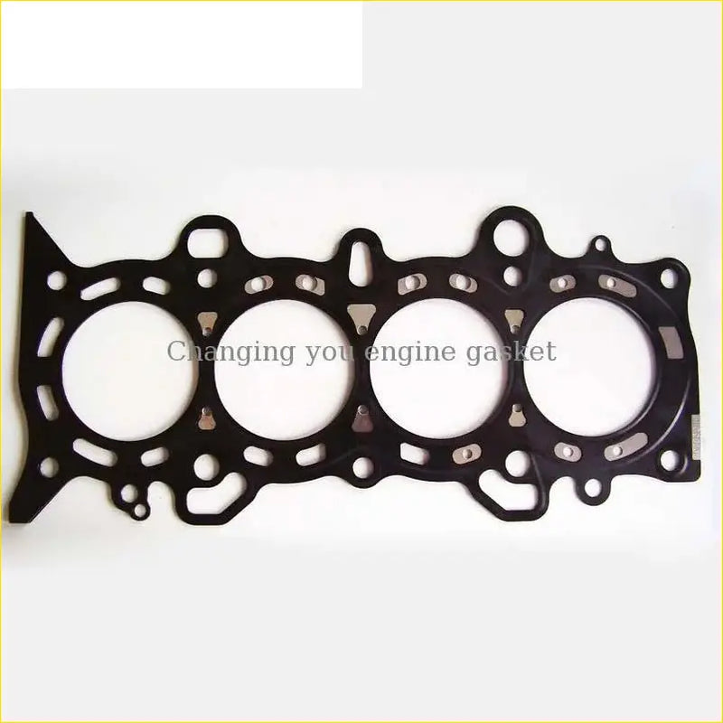 Black engine head gasket with four circular openings and metallic holes for gasket pro honda civic vii 1.6 i cylinder head