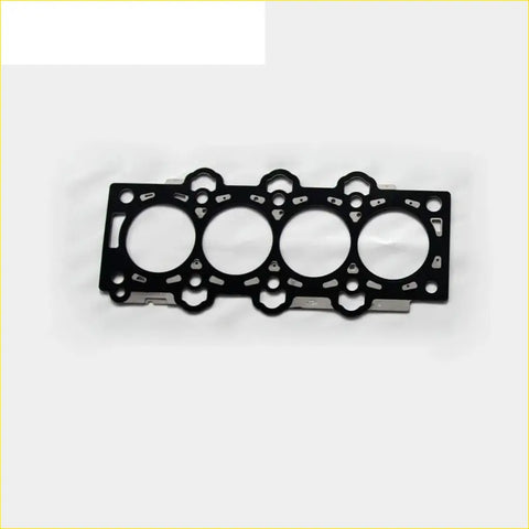 Black metal engine cylinder head gasket with four circular openings and small holes for kia rio ii hyundai matrix fc 1.5
