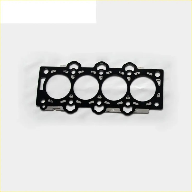 Black metal engine cylinder head gasket with four circular openings and small holes for kia rio ii hyundai matrix fc 1.5