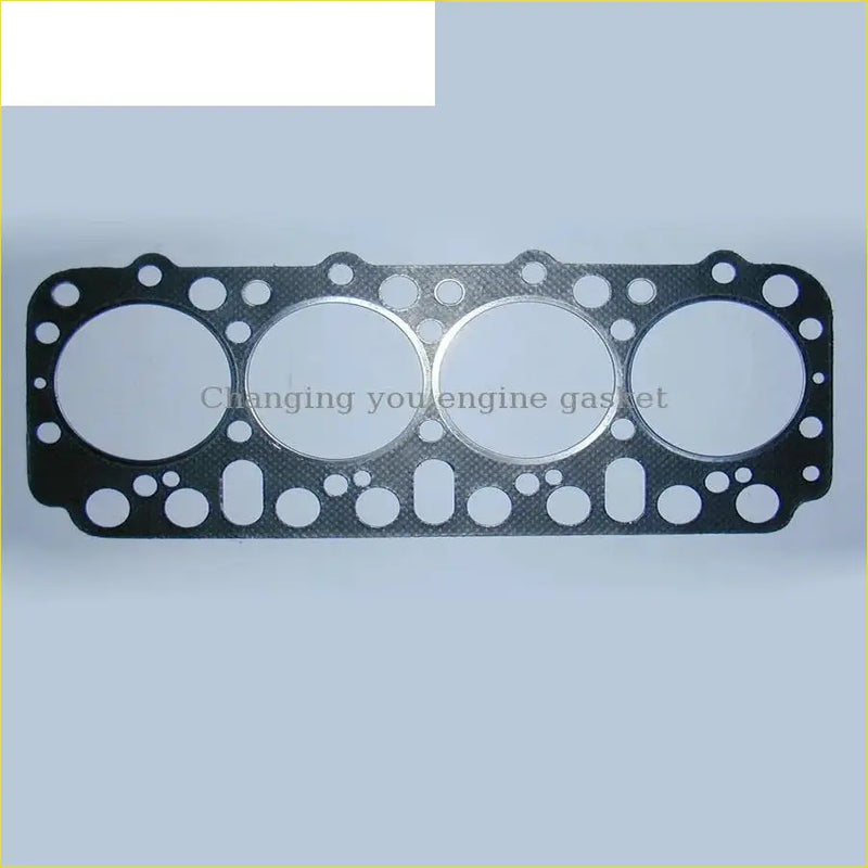 Black textured engine head gasket with four circular openings for nissan truck 33000 cabstar f22 h40 3.3l td