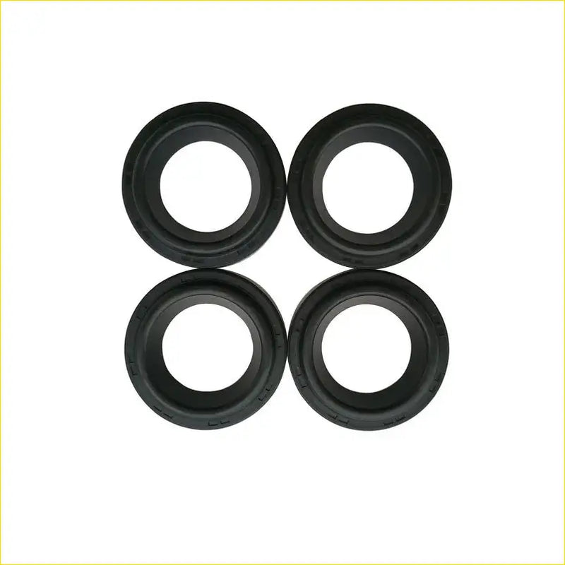 Four black rubber spark plug gaskets arranged in a square for honda civic 16v valve cover parts