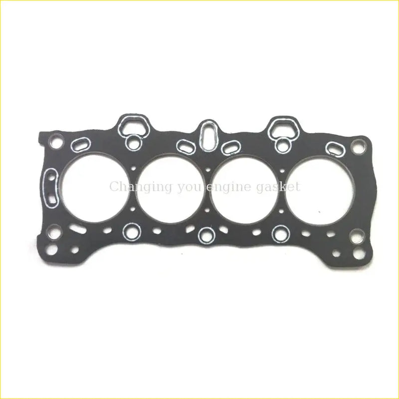 Black gasket pro cylinder head gasket with four circular openings and bolt holes for honda concerto integra crx engines