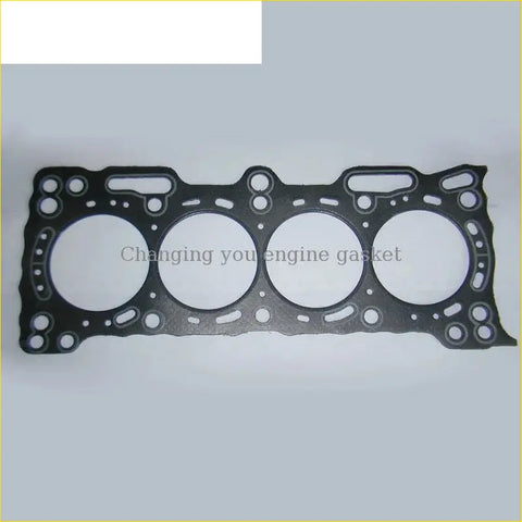 Black engine head gasket with four circular openings and textured surface for honda prelude 16v b20a3 cylinder head