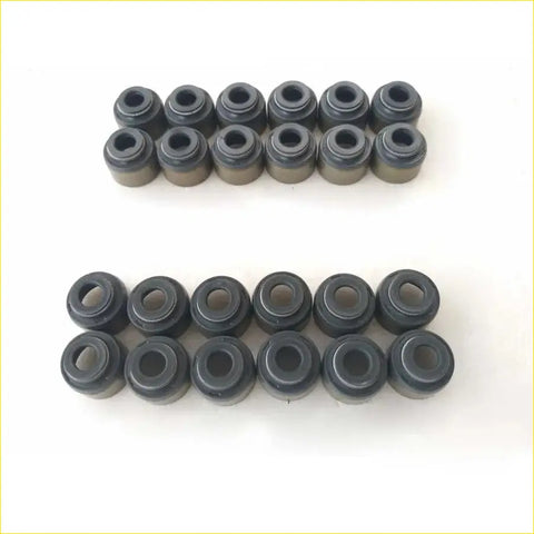 Black rubber valve stem seals arranged in two neat rows for hyundai santa i 27l gasket pro 24pcs set