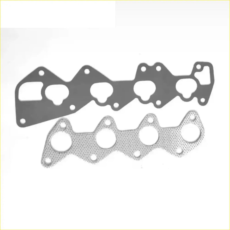 Two metallic silver engine head gaskets one smooth and one perforated for mitsubishi pajero mini 700 dohc 4a30 manifold