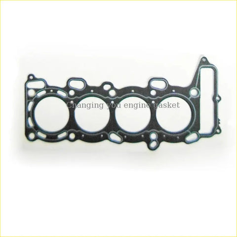 Black engine head gasket with four circular openings and reinforced frame for nissan bluebird u13 sr18de overhaul