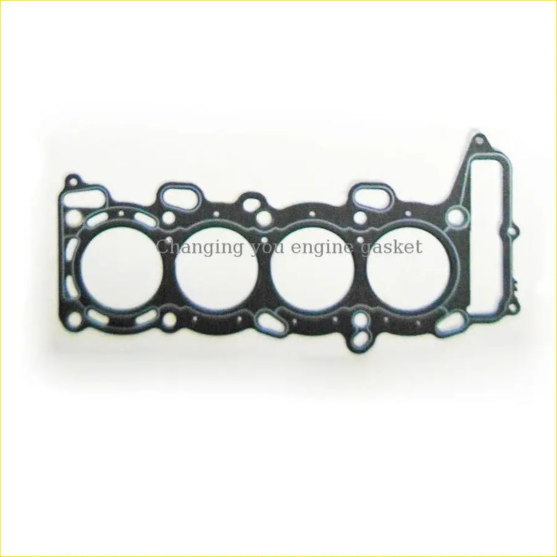 Black engine head gasket with four circular openings and reinforced frame for nissan bluebird u13 sr18de overhaul