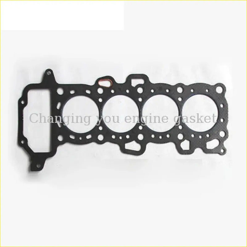 Black gasket pro engine head gasket with four circular openings and textured surface for nissan micra 16v cg10de cg13de