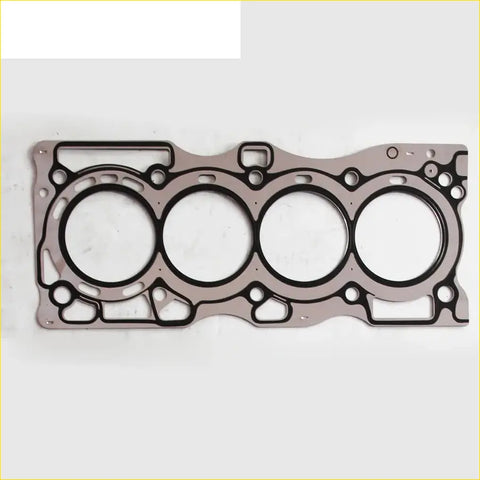 Metallic gray engine head gasket with four circular openings and black rubber seals for nissan primera x-trail cylinder head