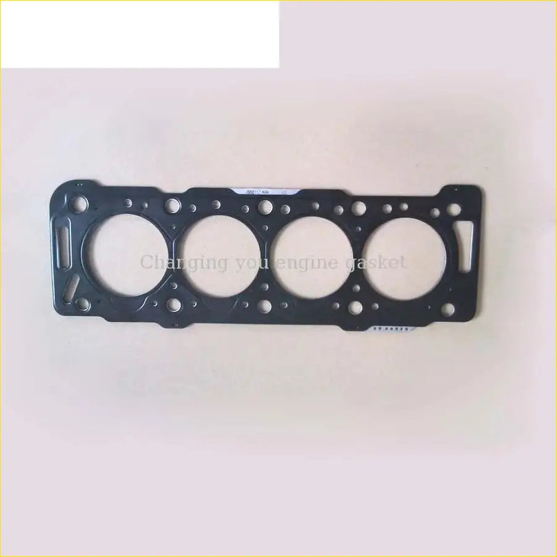 Black metal cylinder head gasket with four circular openings and bolt holes for peugeot 206 306 citroen c15 dw8