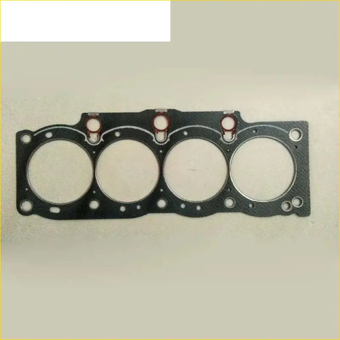 Black engine head gasket with four circular openings and red-ringed bolt holes for toyota camry or celica coupe 2.2 5sfe