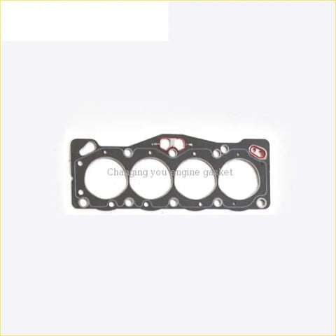 Black engine head gasket with three circular openings and red sealing rings for toyota corolla tercel corsa 2a-u 2a-l