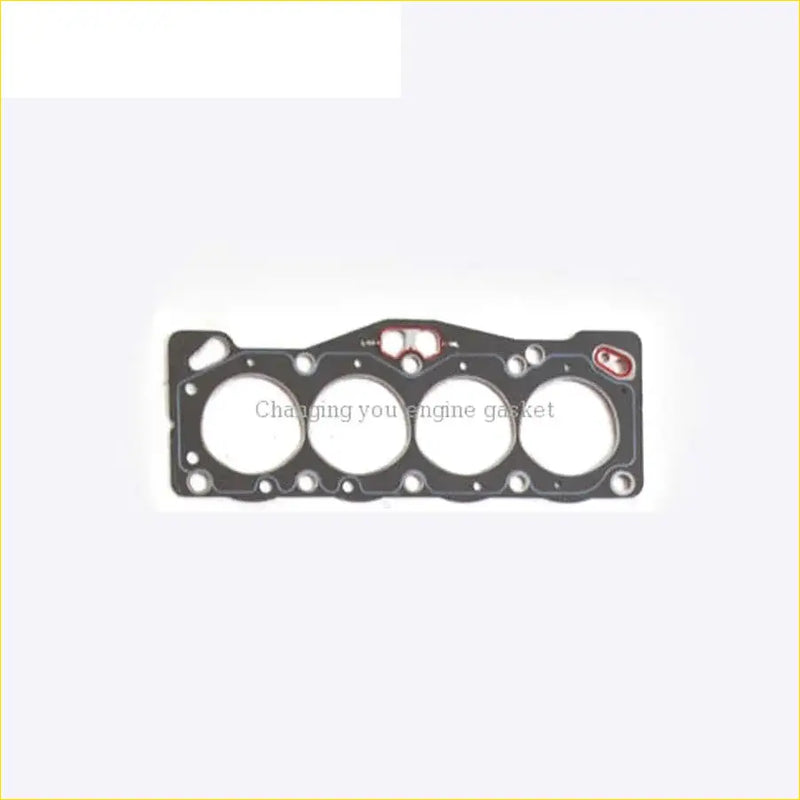 Black engine head gasket with three circular openings and red sealing rings for toyota corolla tercel corsa 2a-u 2a-l