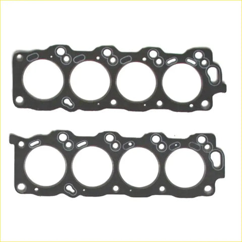 Black rubber engine head gasket with four circular openings and bolt cutouts for toyota crown majesta 4.0l 1uzfe engine