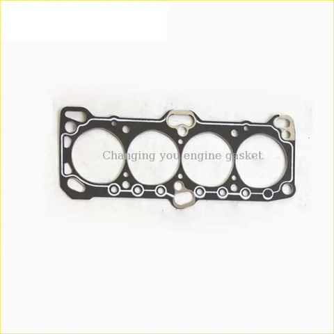 Black engine head gasket with four circular openings and metallic bolt holes for hyundai sonata h1 h100 by gasket pro