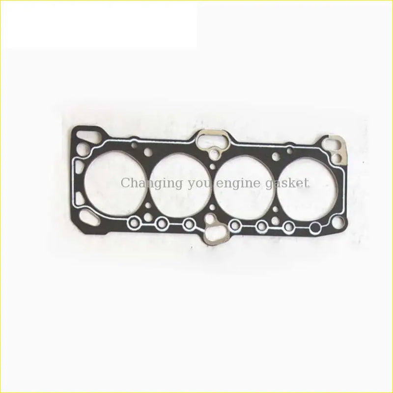 Black engine head gasket with four circular openings and metallic bolt holes for hyundai sonata h1 h100 by gasket pro