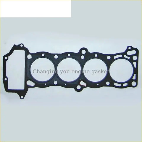 Black engine head gasket with four circular openings and mounting holes for nissan sunny nx coupe dohc 16v 16l