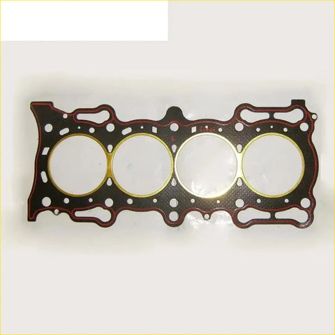Black gasket pro cylinder head gasket with four gold-ringed cylinders and red seals for honda accord prelude and rover 600