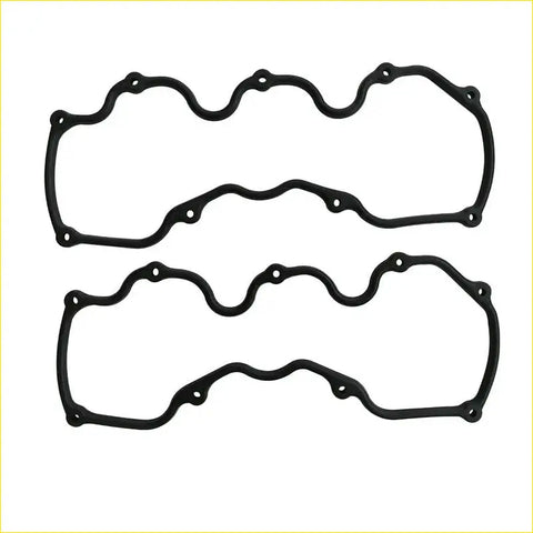 Black rubber valve cover gaskets with wavy segmented design and mounting holes for gasket pro infiniti maxima j30 and nissan pick up