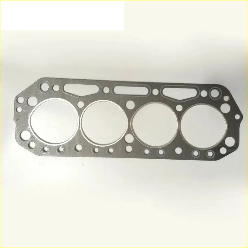 Silver metallic cylinder head gasket with four circular openings and edge holes for nissan cabstar pickup j15 j16