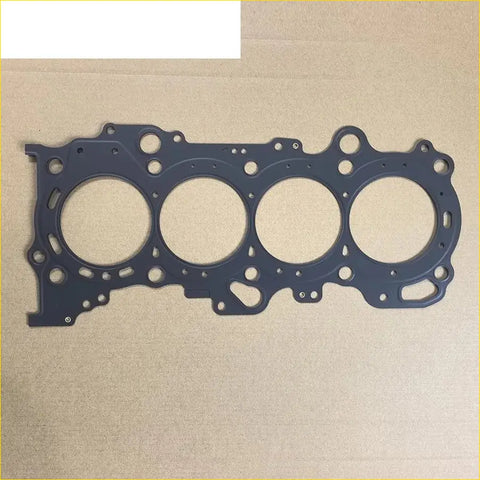 Black rubber head gasket with four circular openings and bolt holes for gasket pro k15b suzuki ertiga jimny 1.5 16v metal part