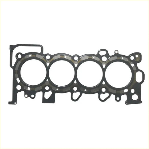 Black rubber gasket with four circular openings and mounting holes for metal cylinder head part in honda city jazz ii