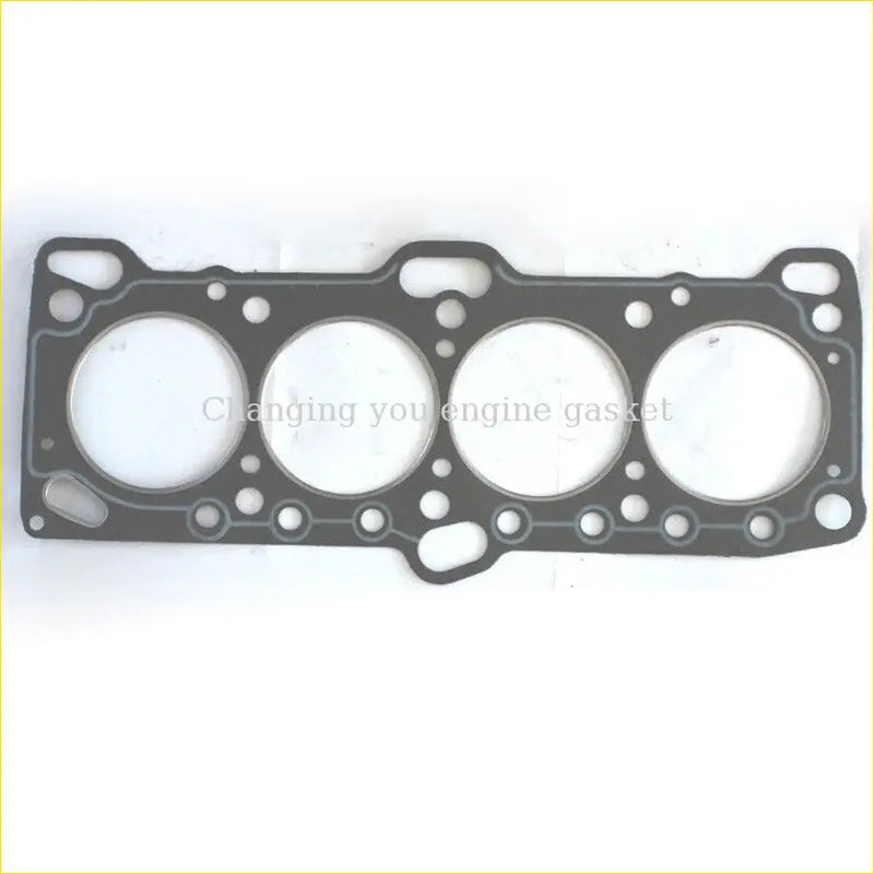Black engine head gasket with four circular openings and bolt holes for mitsubishi lancer 4g67 and hyundai lantra g4cn