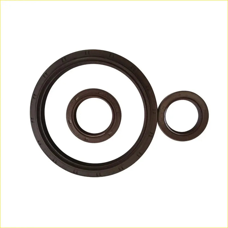 Set of three dark brown rubber crankshaft oil seals with molded grooves for mazda e2200 bus b2200 pickup