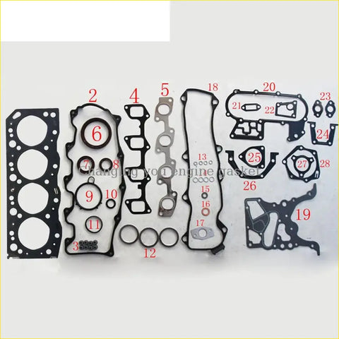 Black rubber engine gaskets with metal parts and numbered labels for gasket pro toyota mark ii saloon 2.4 td 2lt full set