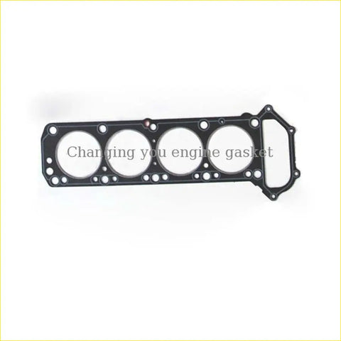 Black gasket pro engine head gasket with four circular openings and rectangular cutout for nissan z20 truck 2.0