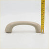 Beige plastic grab handle with rounded ends and textured grip for Toyota Hilux SR5 MK6 2004-2013 car interior