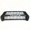 Black toyota gr grille for hilux 2021-2024 sr sr5 with honeycomb mesh pattern and silver lettering