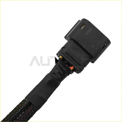 Black plastic halogen to led taillight adapter harness with braided cable housing for ford f-150 shown from back side