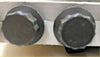 Two dark gray hexagonal headed head bolts with textured surface for 2.5 td did 16v l200 triton pajero sport