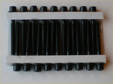 Black threaded steel head bolts with hexagonal heads arranged in white tray for navara d22 d40 np300 pickup