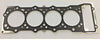 Black rubber head gasket with metallic silver edges and four circular openings for mitsubishi l200 shogun pajero 3.2 did td 4m41