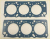 Dark blue head gasket set with three circular openings and bolt cutouts for mitsubishi challenger pajero 3.0 6g72 vrs
