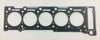 Black engine head gasket with five circular openings and smaller edge holes for om612 27 cdi engine use