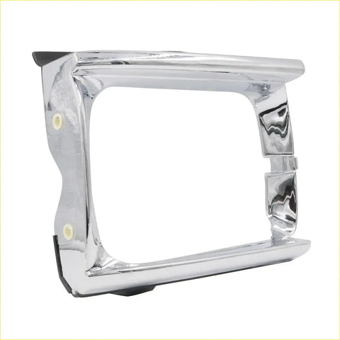 Chrome finished rectangular headlight bezel with polished metal finish and black rubber pads for toyota hilux left side