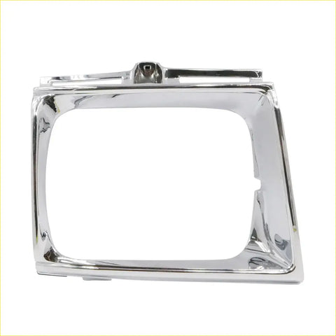 Chrome finished rectangular headlight bezel with rounded corners and central mounting bracket for toyota hilux 4wd