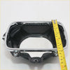 Chrome-finished headlight bucket with black interior and brackets for toyota hilux 1988-1995 shown from the back side