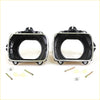 Black and chrome headlight bucket assemblies with mounting hardware for Toyota Hilux 1988-1995 showing back side