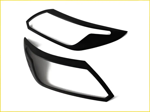 Black plastic headlight cover trim pieces for chevrolet colorado trailblazer 2017 to 2019 shown from back side