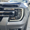 Headlight covers for ford ranger 2022 with sleek chrome accents and modern led lighting in black housing