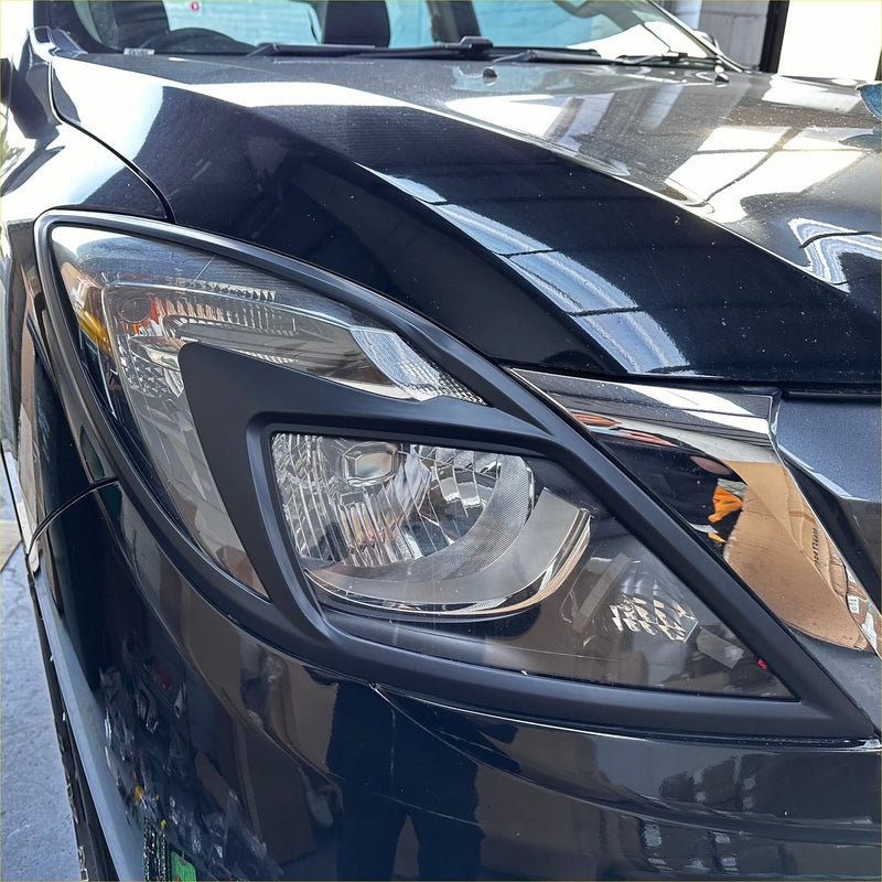 Black glossy headlight cover with sleek angular design and clear lens for mazda bt-50 2012-2020 matte finish